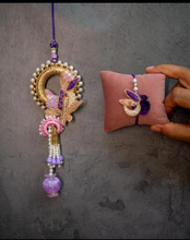 Purple Flower Rakhi Pair Set