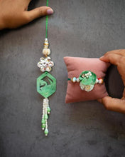 Resin pestal green rakhi pair set