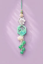 Resin pestal green rakhi pair set