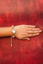 Green, red and pearls watch rakhi