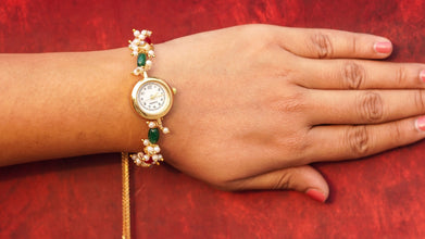Green, red and pearls watch rakhi