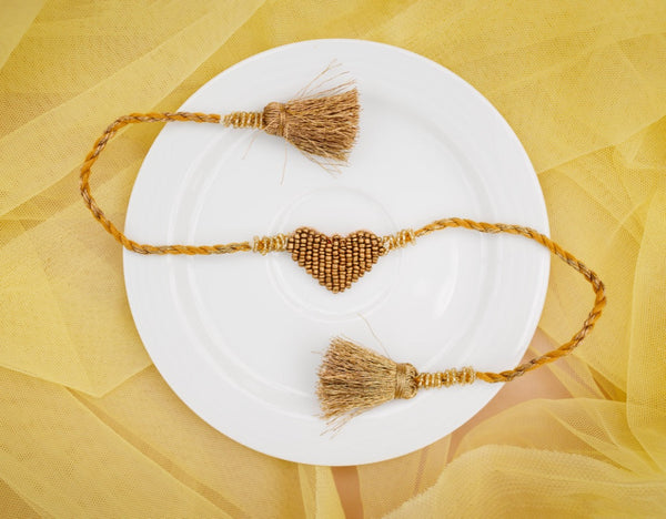 Gloden heart beaded bhai rakhi