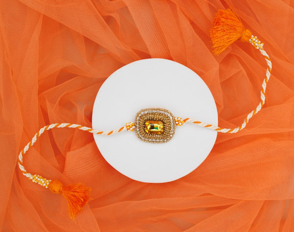 Orange white stone bhai rakhi