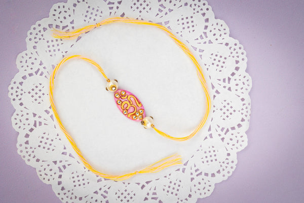 Bhai Pink Yellow Om Rakhi
