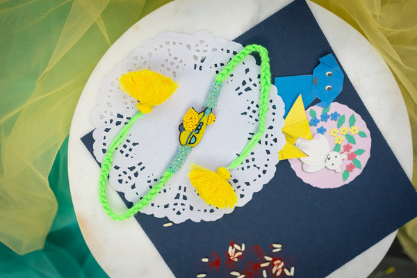 Kid's Yellow and Blue Aeroplane Beaded bulk Rakhi